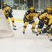 Wolverines center jeff Rohrkemper skates the puck back around the goal during the first period of their game against the Spartans at Yost Ice Arena Friday Feb. 1st.
Courtney Sacco I AnnArbor.com  
